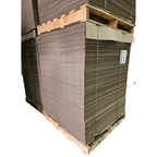 Stacks of corrugated pallet pads